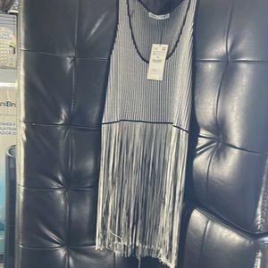 Fun and funky fringed black and white tunic top